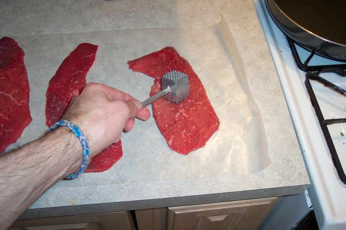 Pounding The Braciole Meat
